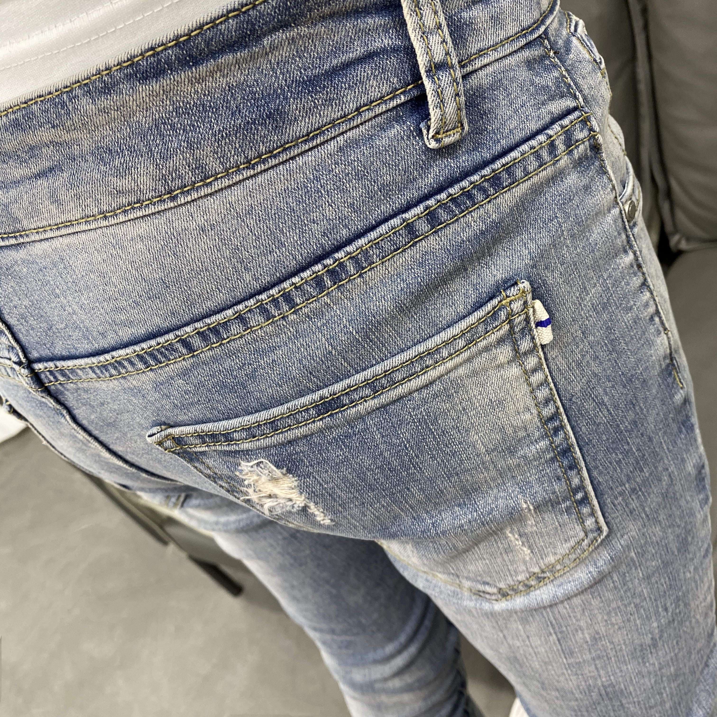 カジュアルスタイル ヴィンテージ風ダメージ加工スキニージーンズ