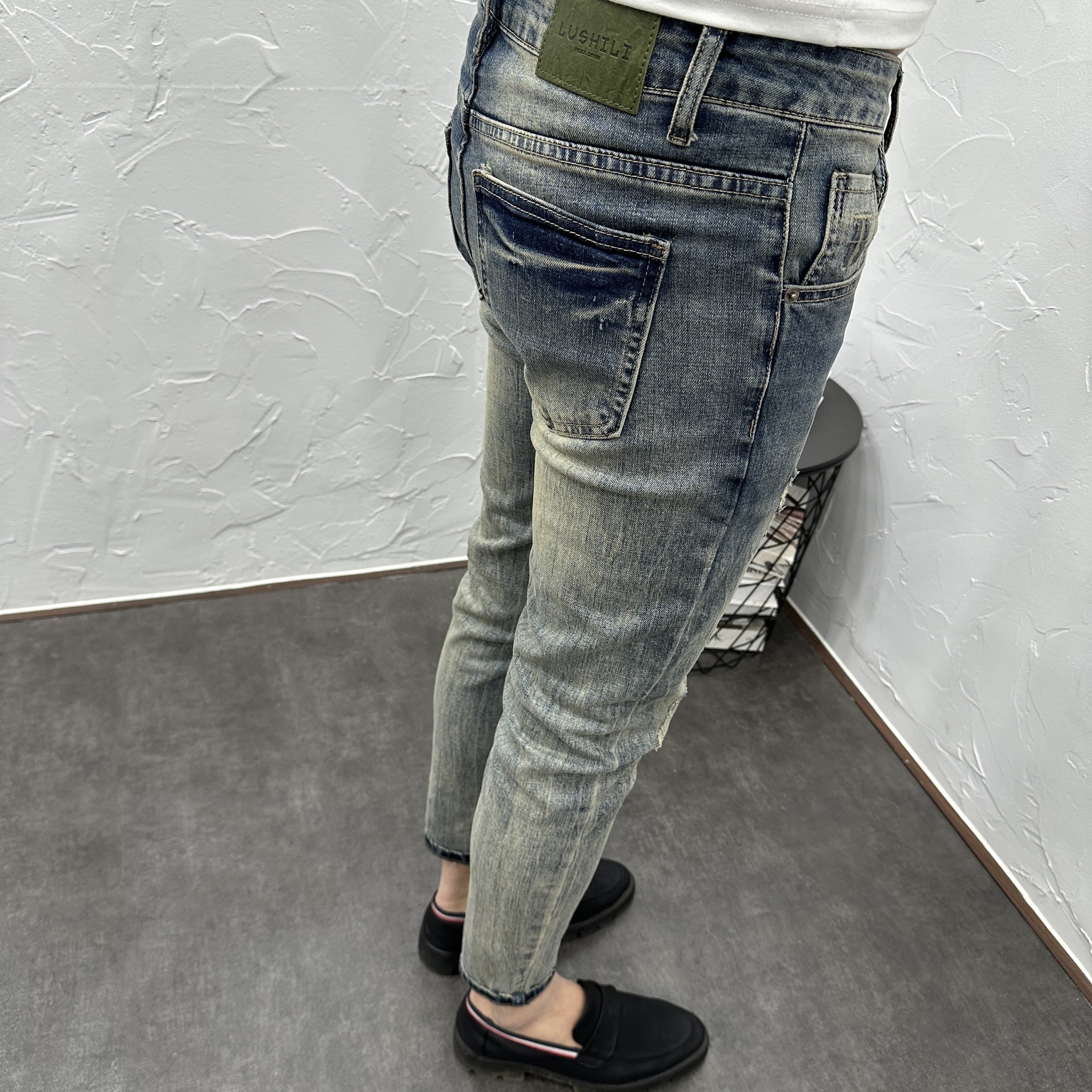 カジュアルスタイル ヴィンテージ風ダメージ加工スリムジーンズ