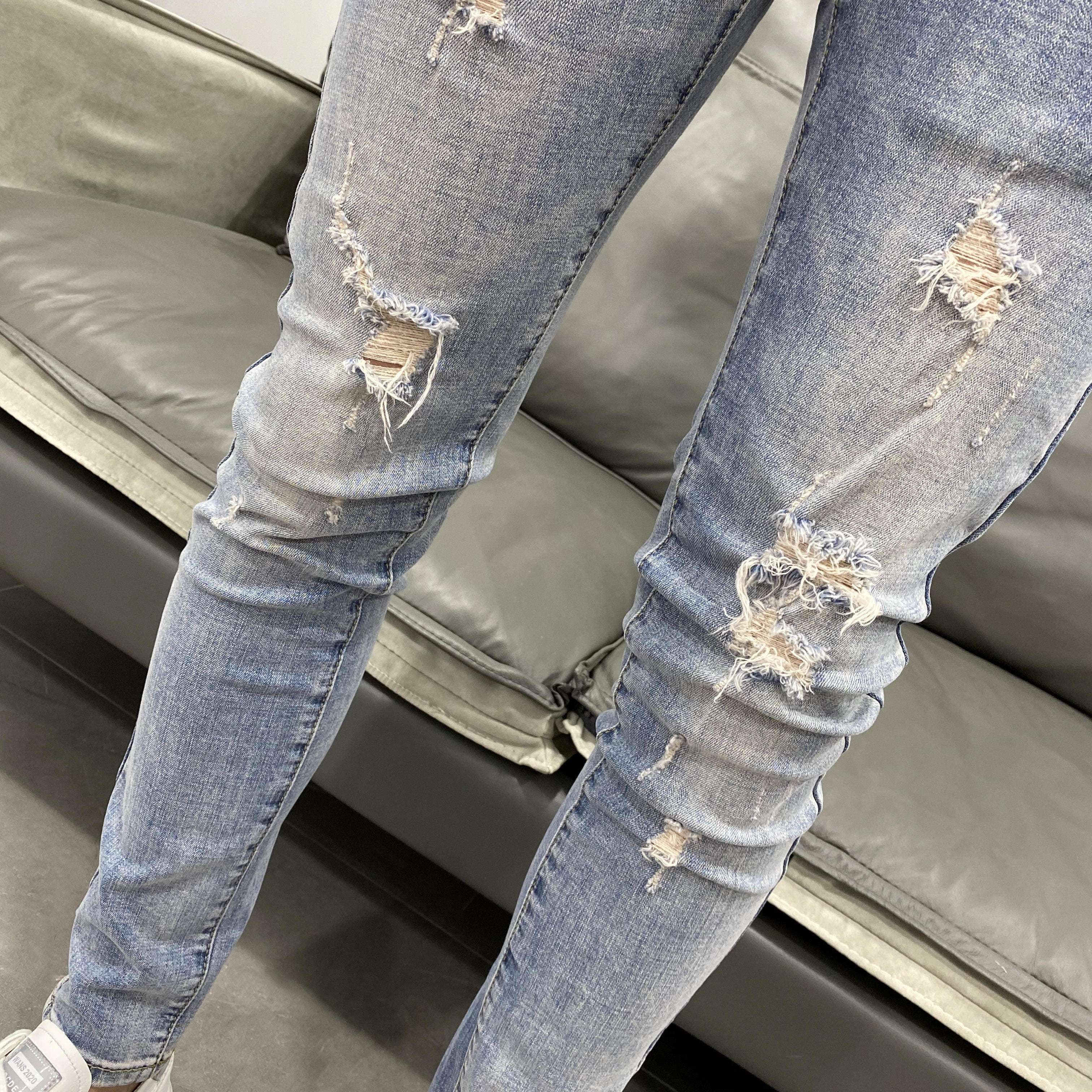 カジュアルスタイル ヴィンテージ風ダメージ加工スキニージーンズ