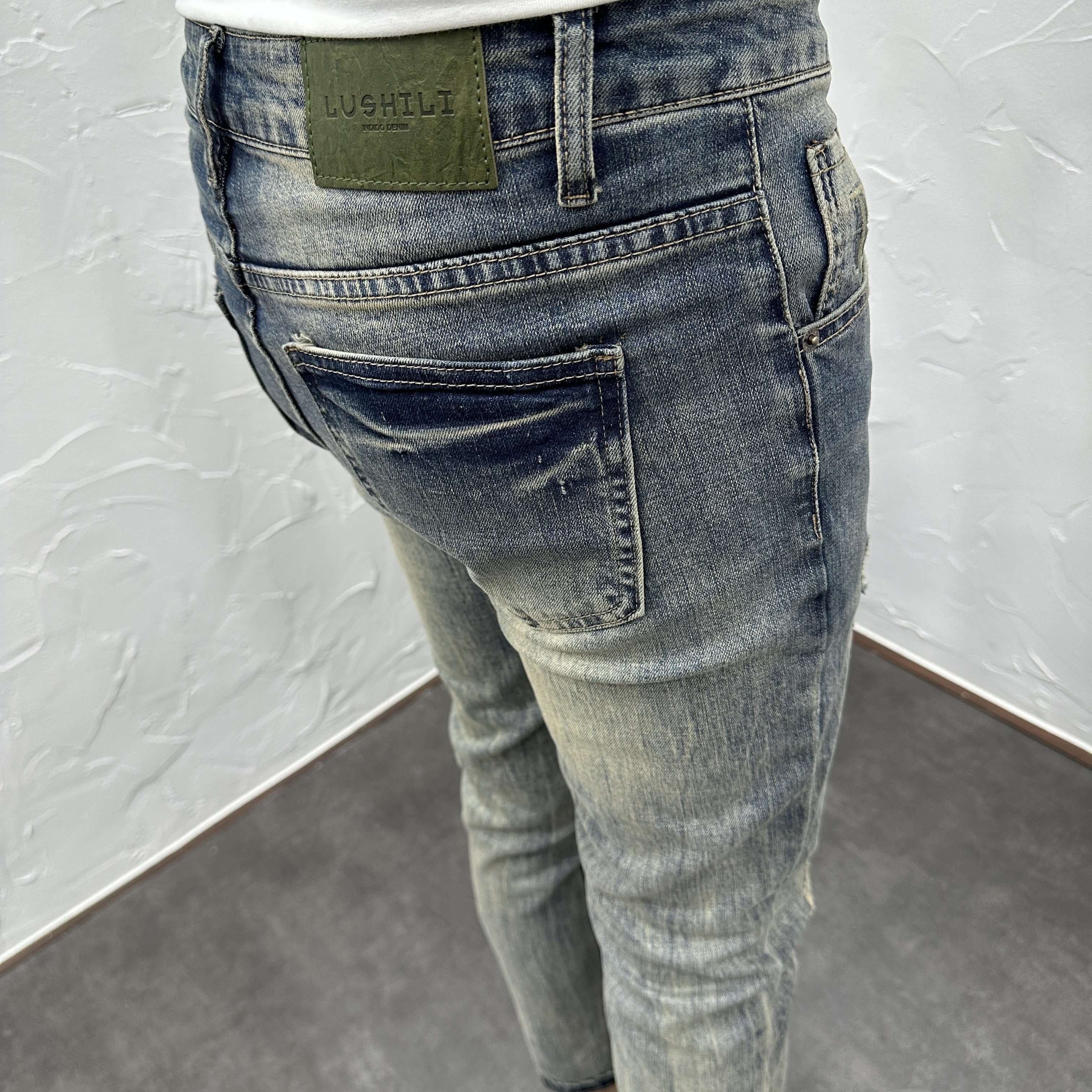 カジュアルスタイル ヴィンテージ風ダメージ加工スリムジーンズ